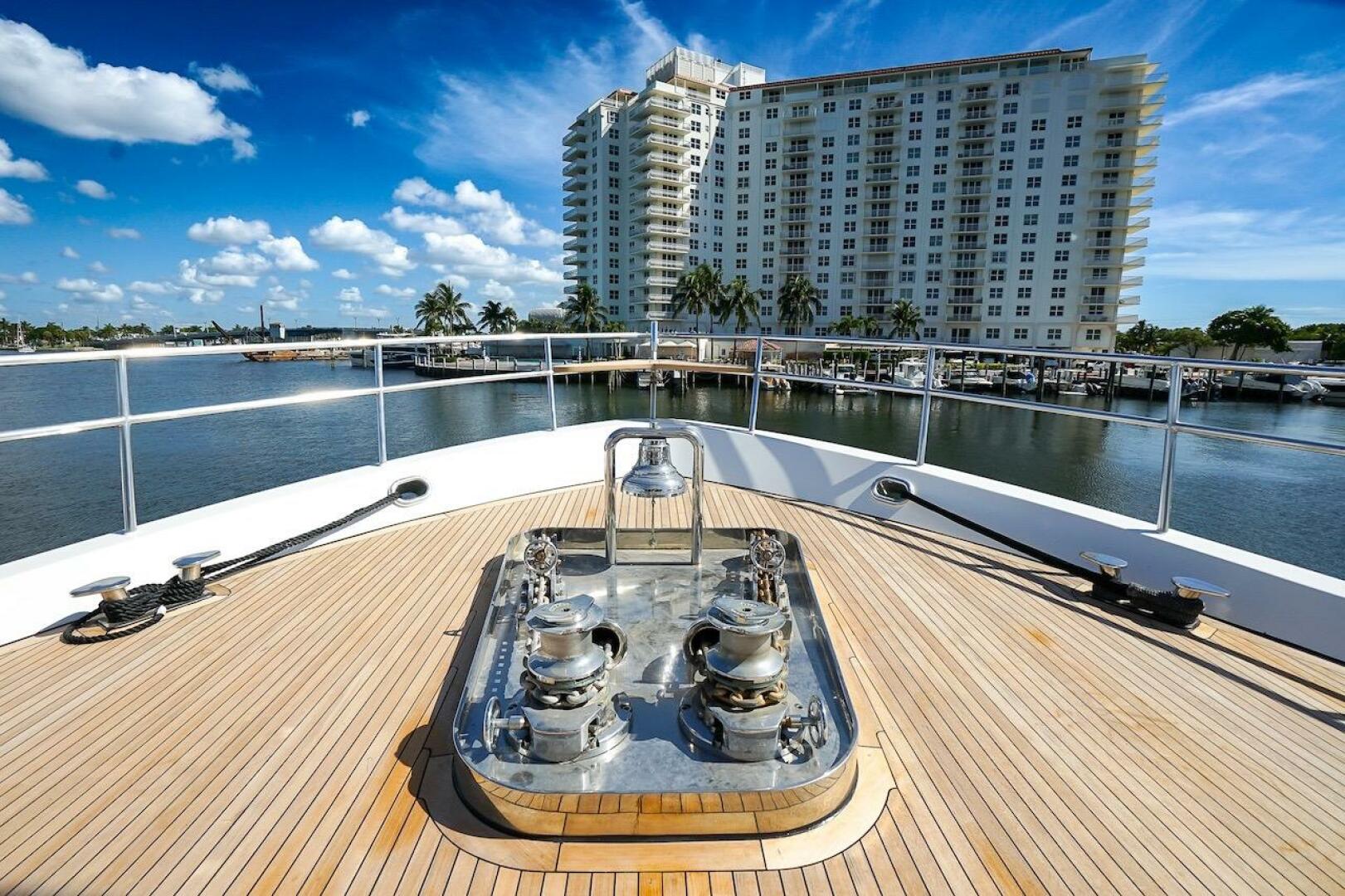 Luxurious 1996 ABD 90 Explorer yacht deck with striped seati
