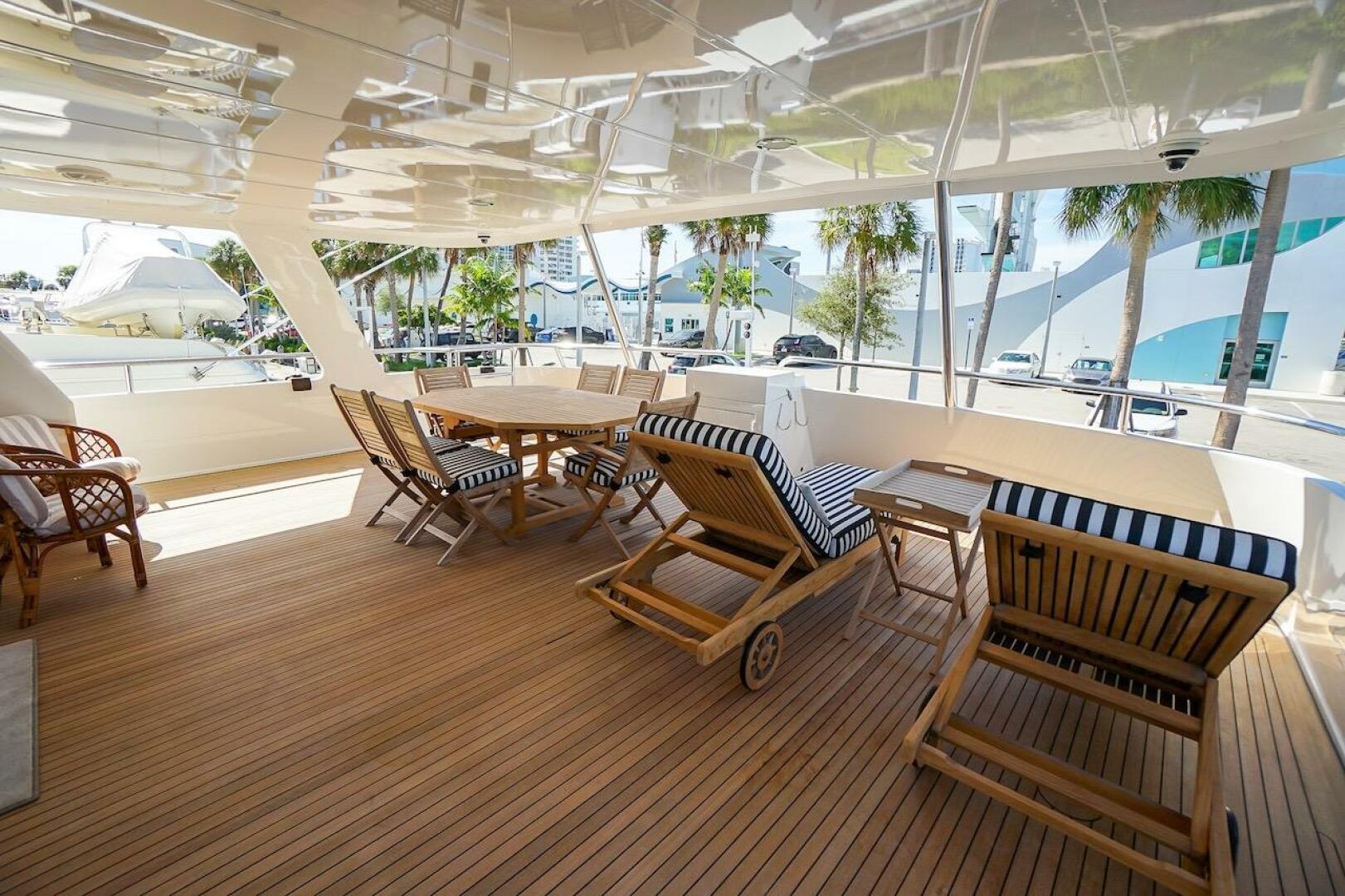 Luxurious deck of 1996 ABD 90 Explorer yacht with wooden fur