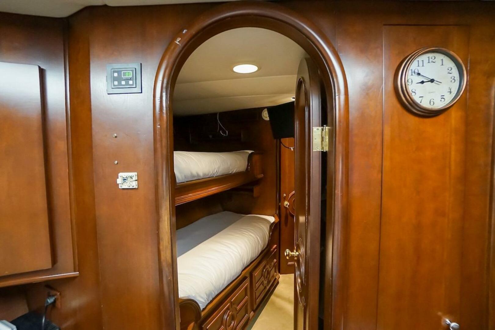 Interior of 1996 ABD 90 Explorer yacht with wooden bunk beds