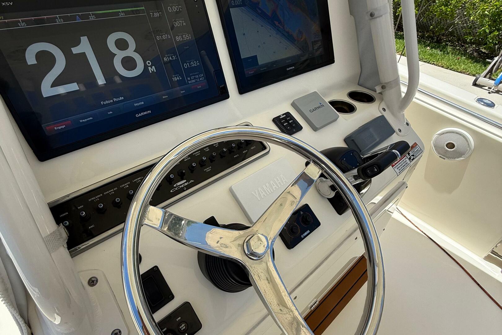 2015 Cobia 296 Center Console helm with Garmin displays and 