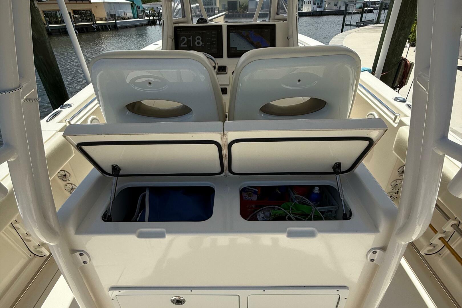 2015 Cobia 296 Center Console boat interior with open storag