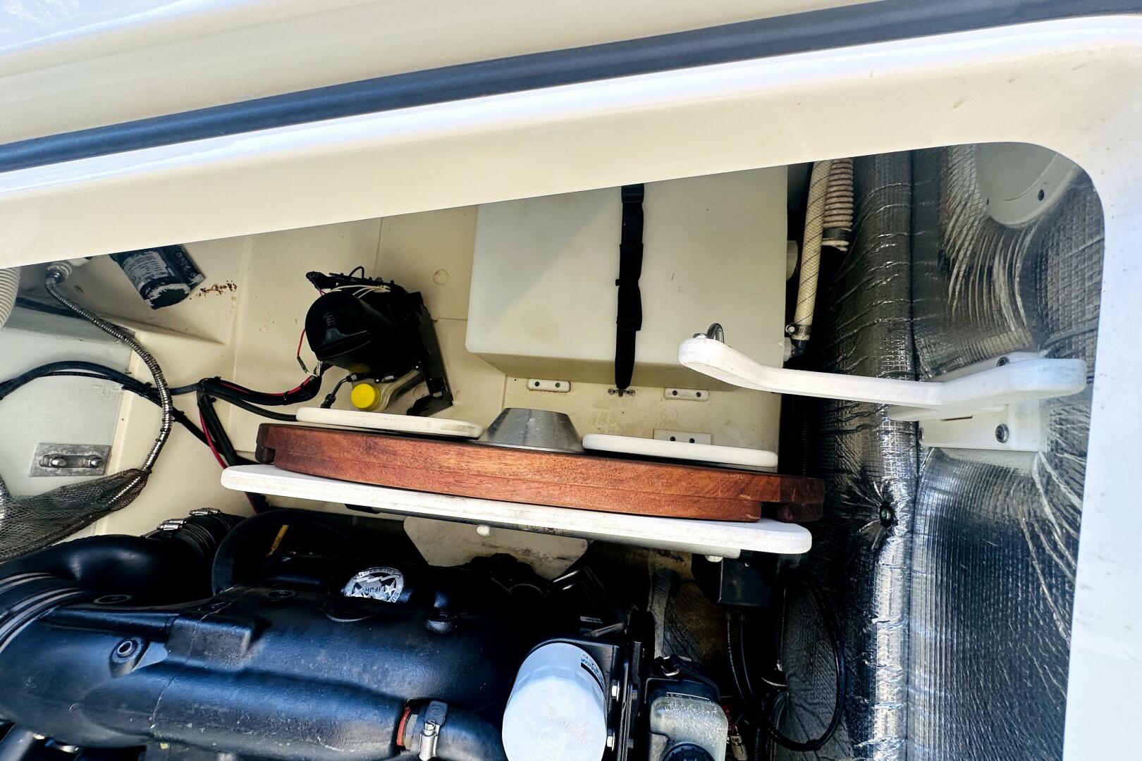 Engine compartment of a 2013 Chris-Craft Corsair 22 boat, sh