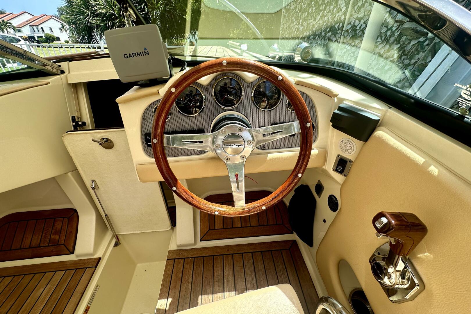 Interior of 2013 Chris-Craft Corsair 22 boat with wooden ste
