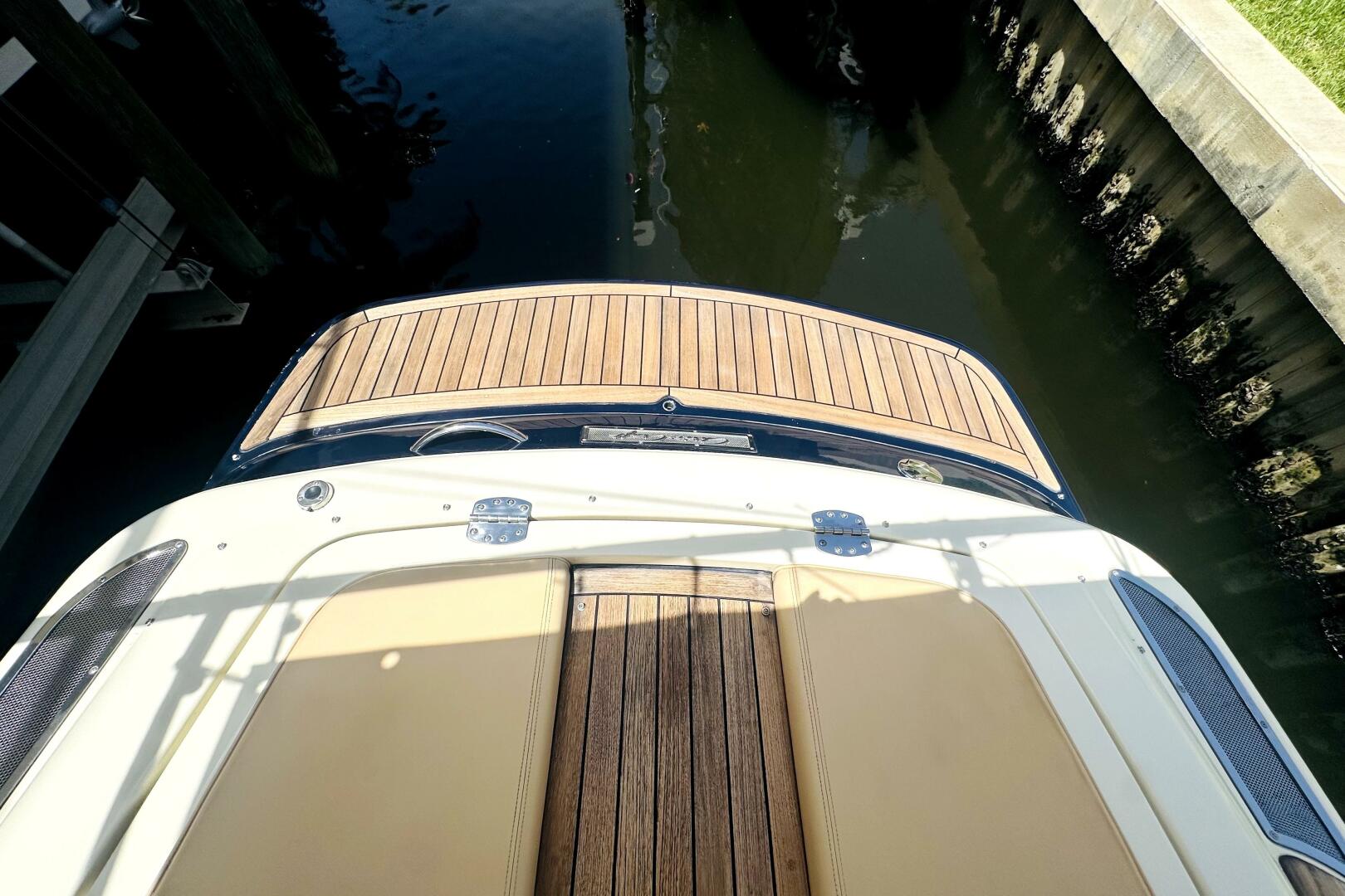 2013 Chris-Craft Corsair 22 boat with teak deck, docked in c