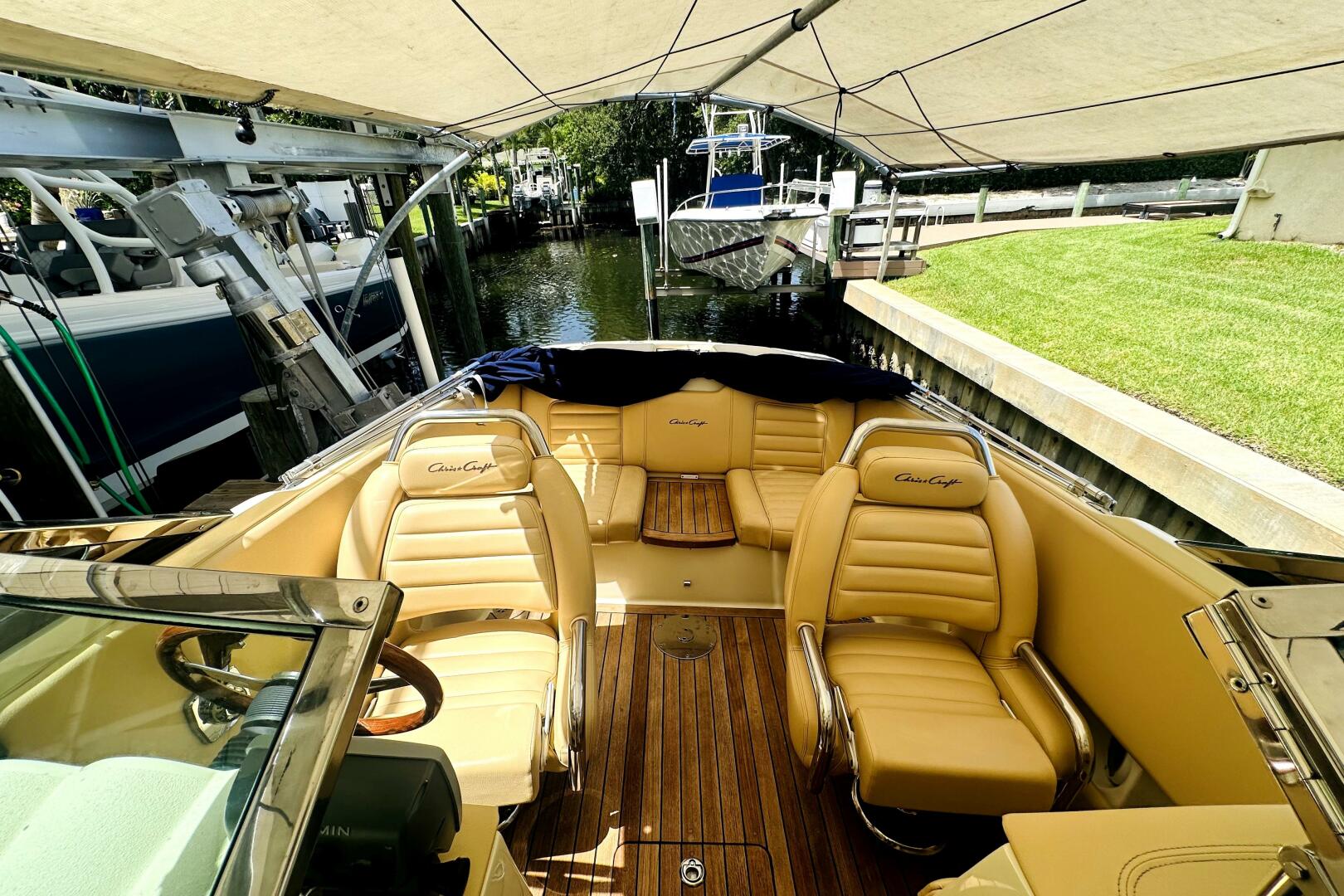2013 Chris-Craft Corsair 22 boat interior with tan leather s
