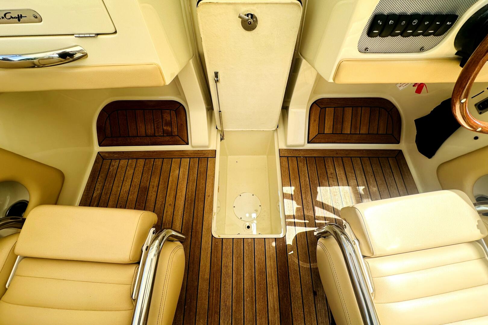 2013 Chris-Craft Corsair 22 interior with teak flooring and 