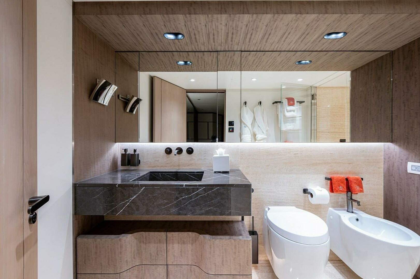 Luxurious bathroom on 2020 Majesty 140 yacht with modern fix