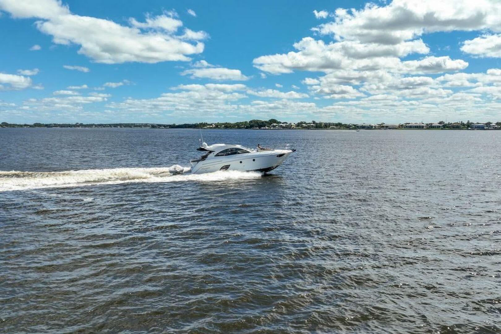 2014 Beneteau Gran Turismo 44 yacht cruising on a sunny day 