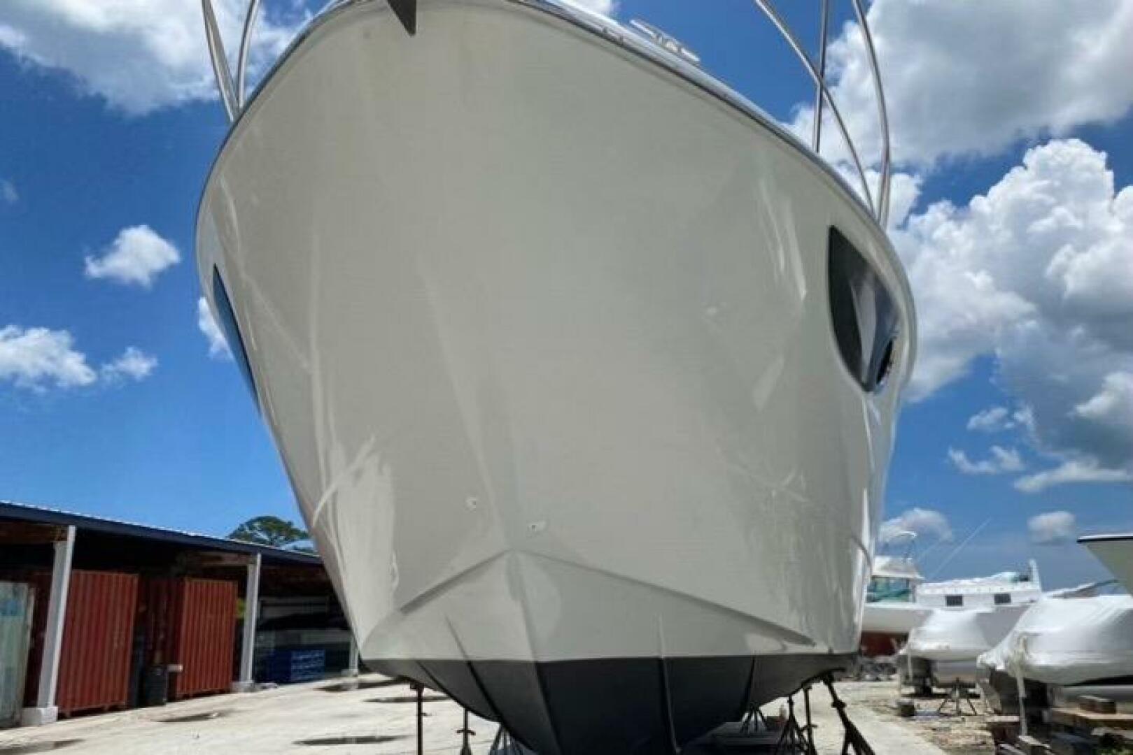 2014 Beneteau Gran Turismo 44 yacht on dry dock under a clea