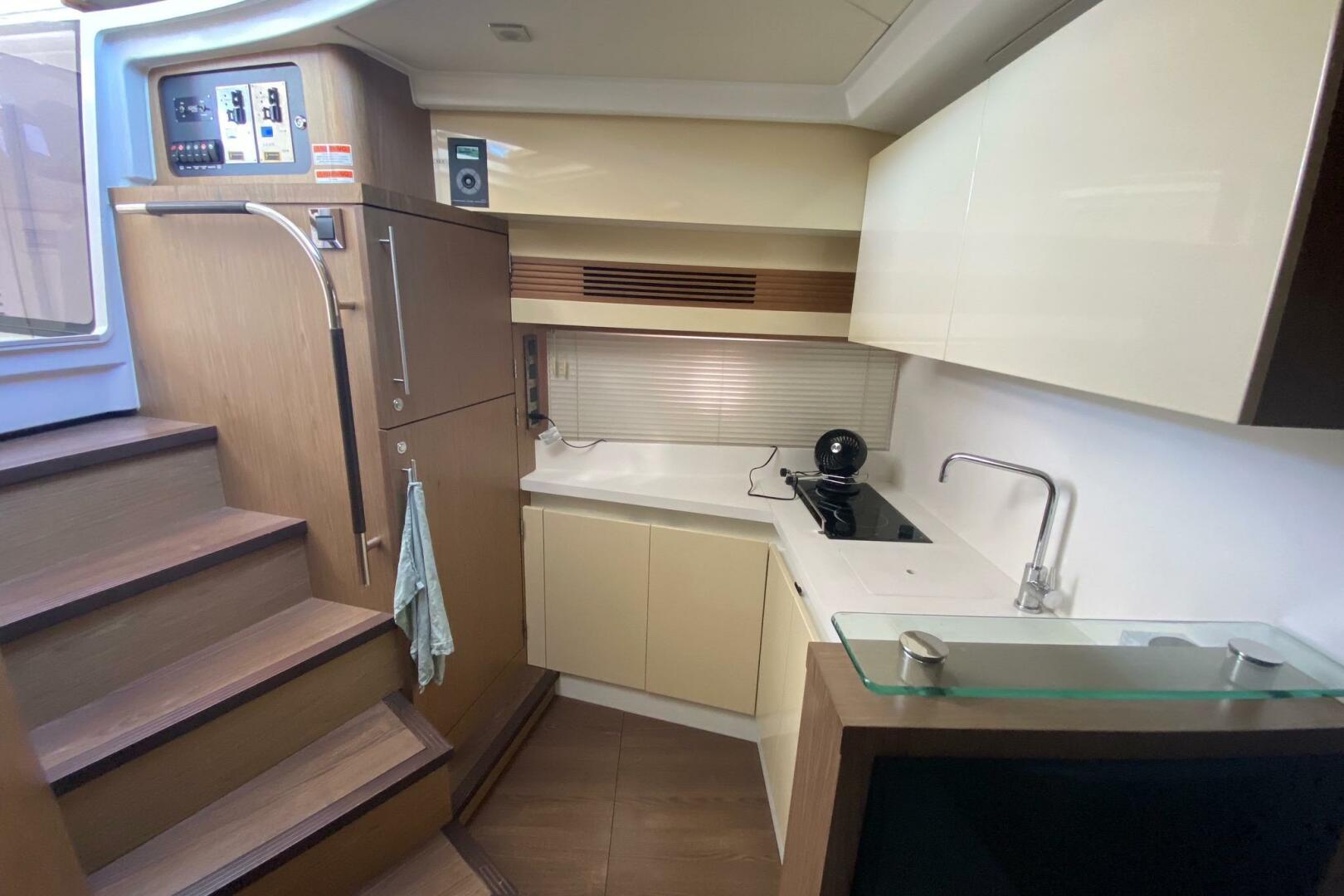2014 Beneteau Gran Turismo 44 yacht interior kitchen with mo