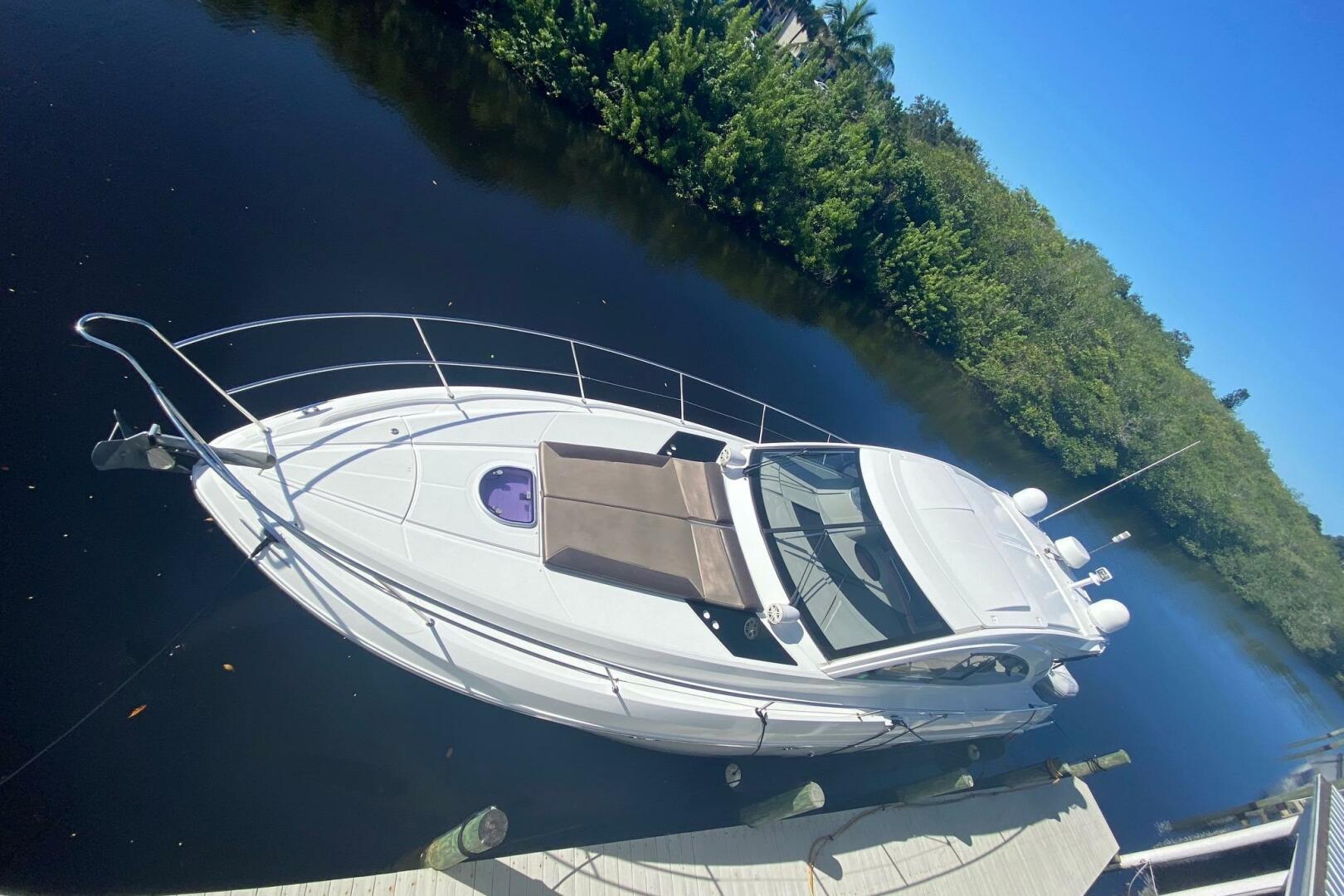 2014 Beneteau Gran Turismo 44 yacht docked on calm water, su