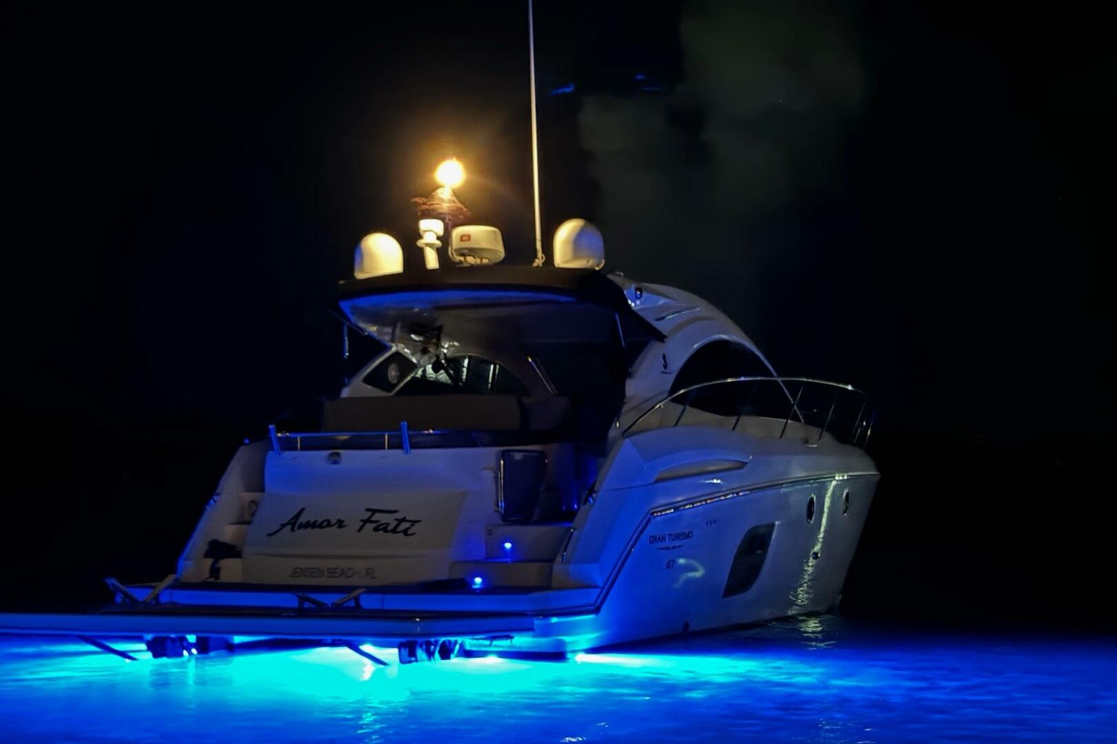 2014 Beneteau Gran Turismo 44 yacht illuminated at night wit