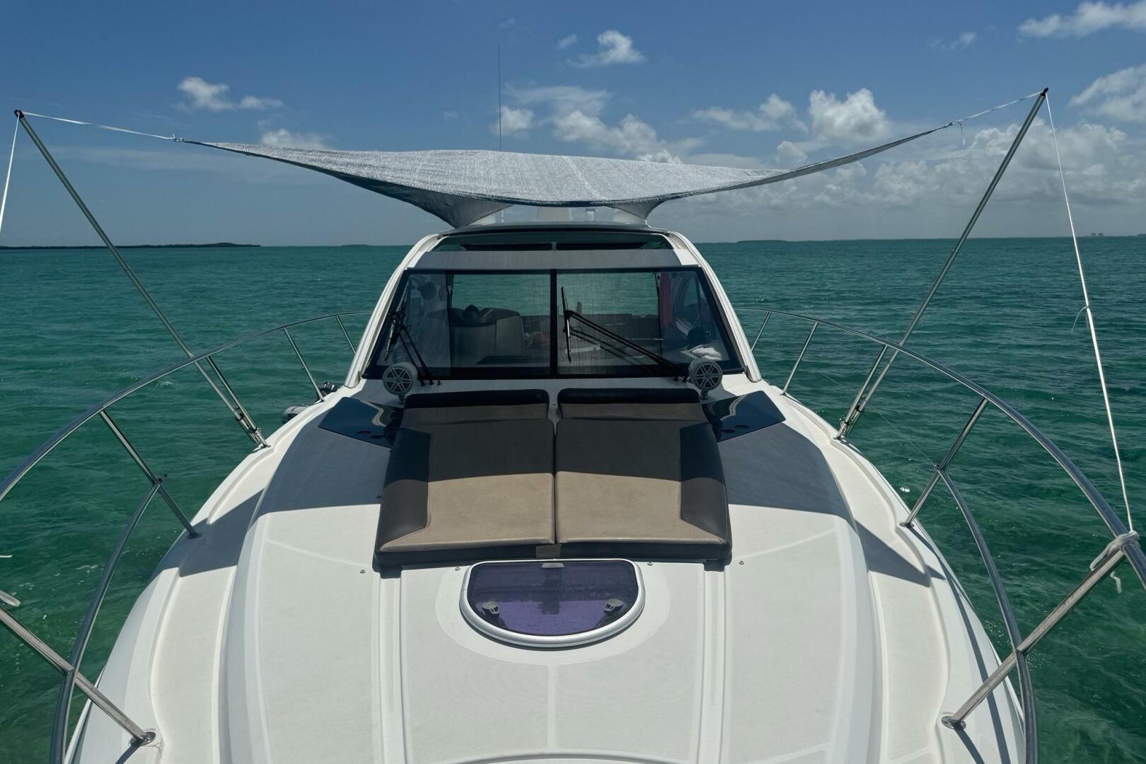 2014 Beneteau Gran Turismo 44 yacht on turquoise water under