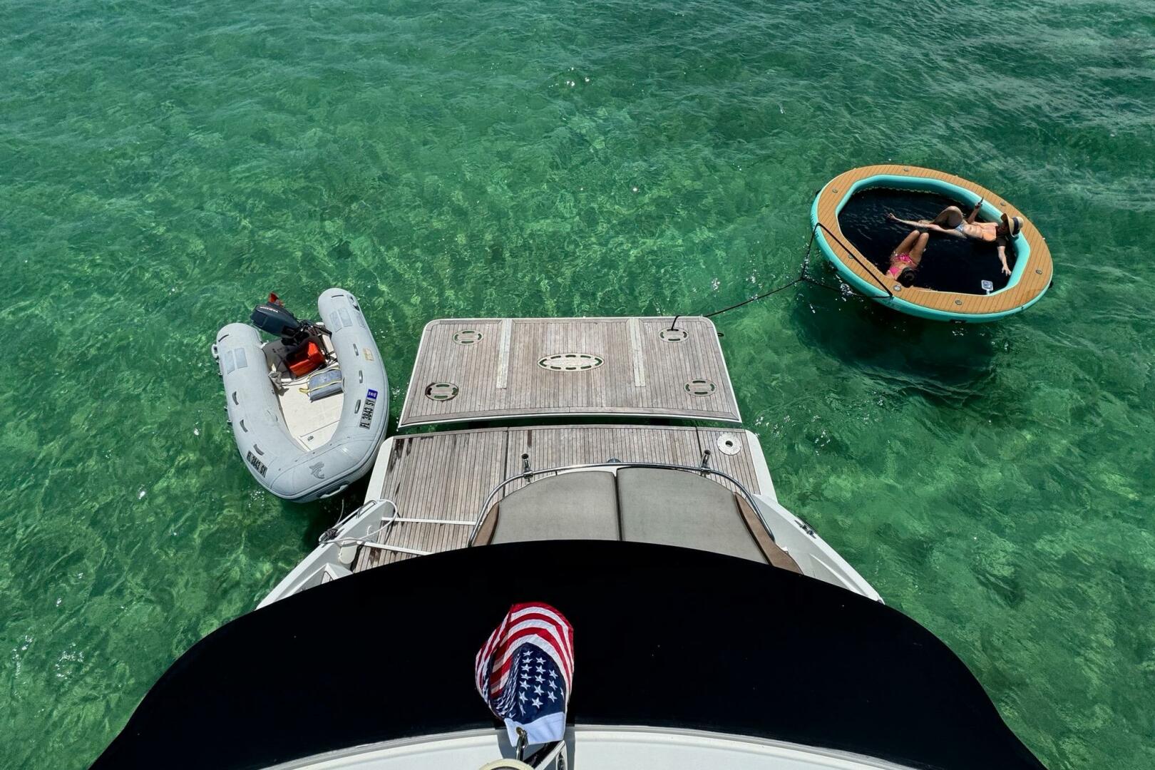 Beneteau Gran Turismo 44 yacht with inflatable boat and floa