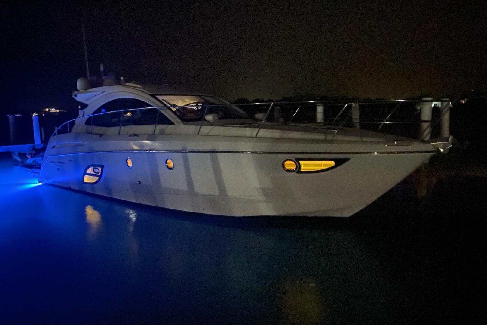 2014 Beneteau Gran Turismo 44 yacht illuminated at night wit
