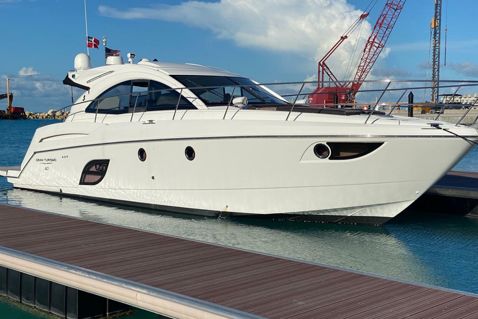 2014 Beneteau Gran Turismo 44 yacht docked at marina, clear 