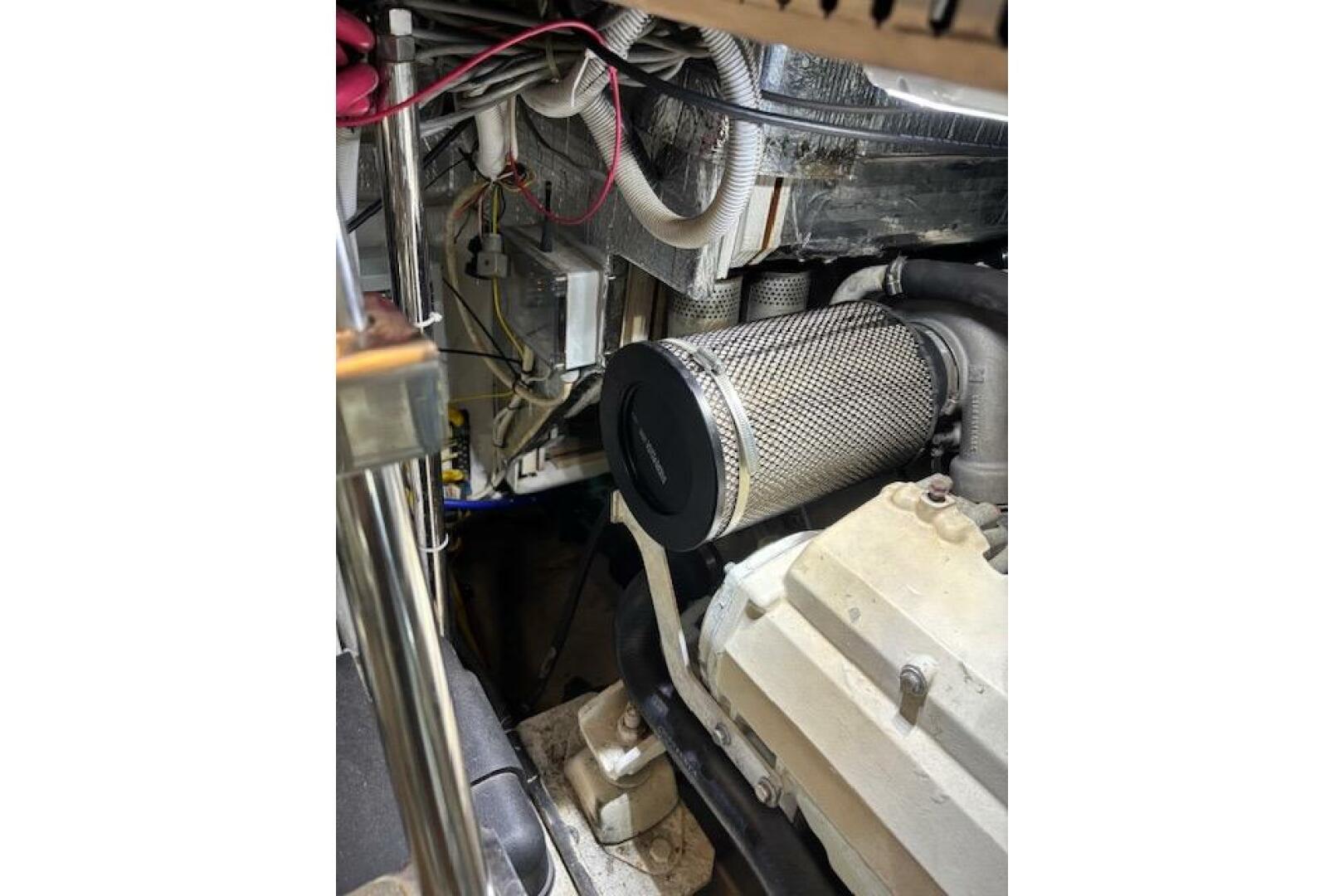 Engine room of 2004 Carver 466 Motor Yacht, showcasing mecha