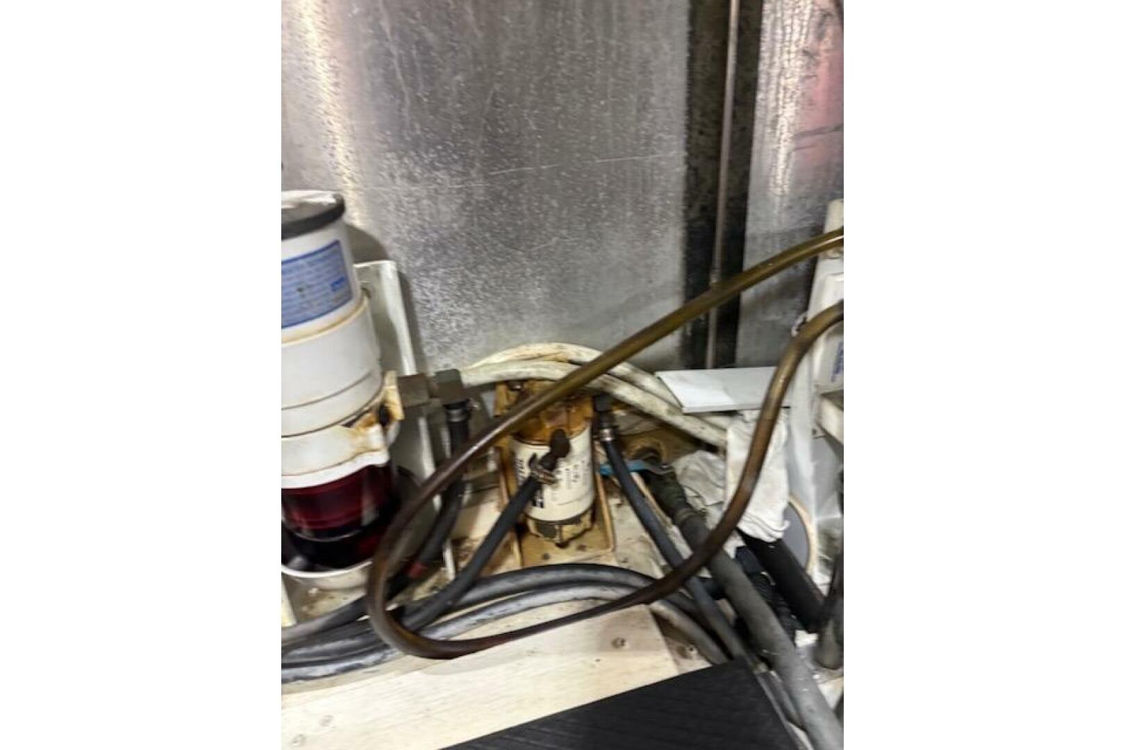 Engine room of 2004 Carver 466 Motor Yacht with visible fuel