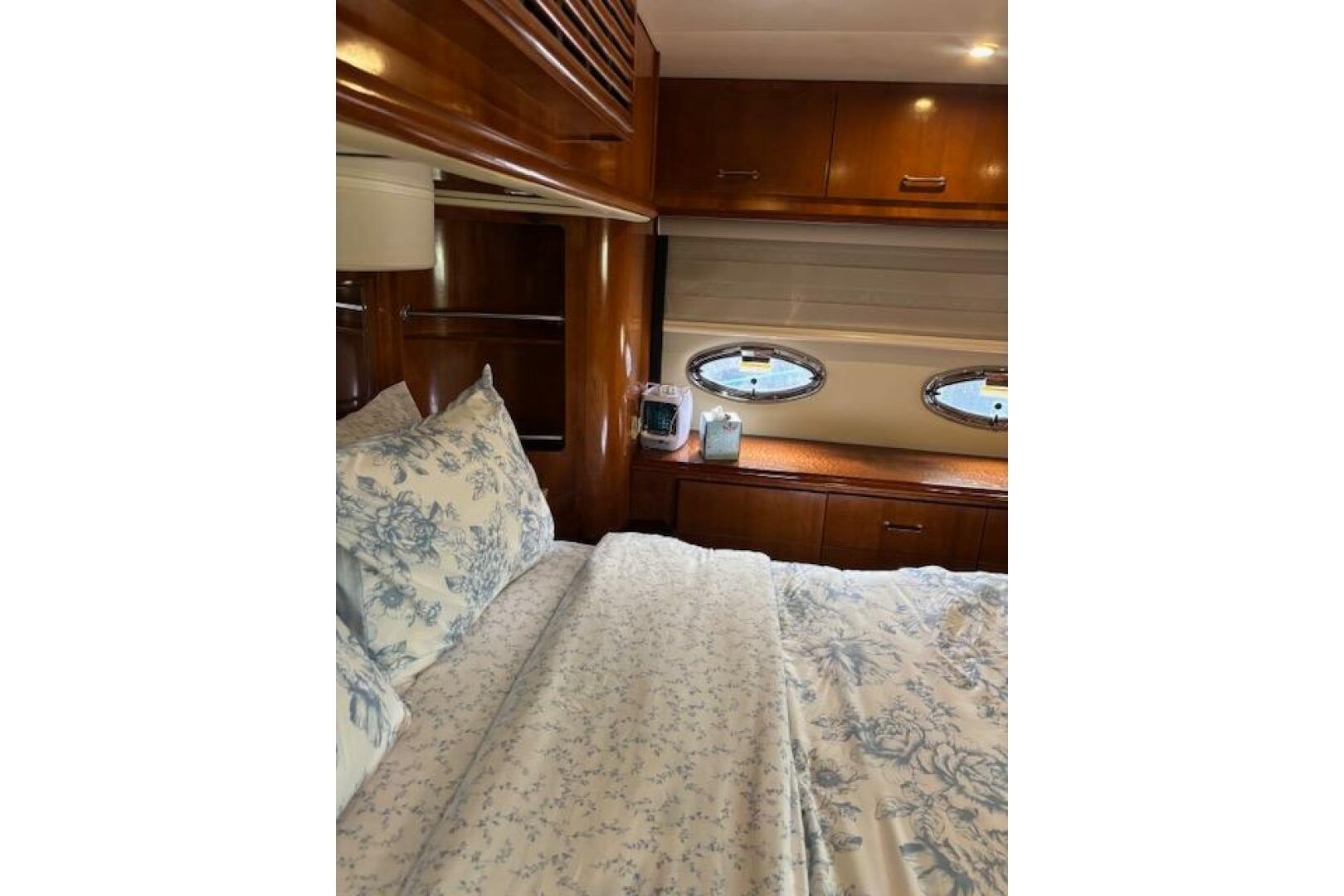 Luxurious bedroom interior of 2004 Carver 466 Motor Yacht wi
