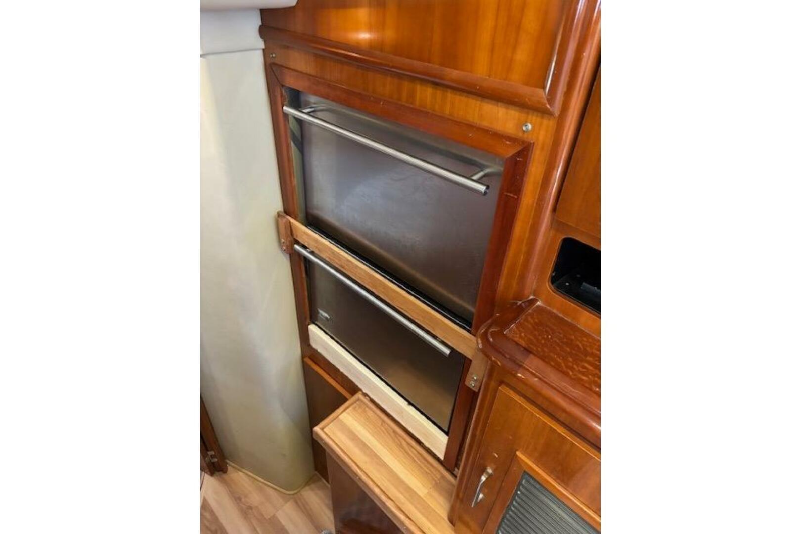 2004 Carver 466 Motor Yacht interior with stainless steel ap