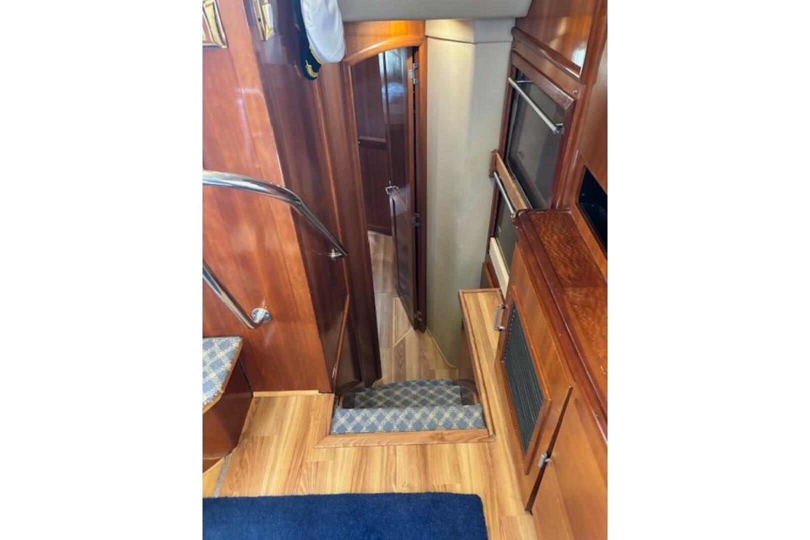 Interior of 2004 Carver 466 Motor Yacht with wooden stairs a
