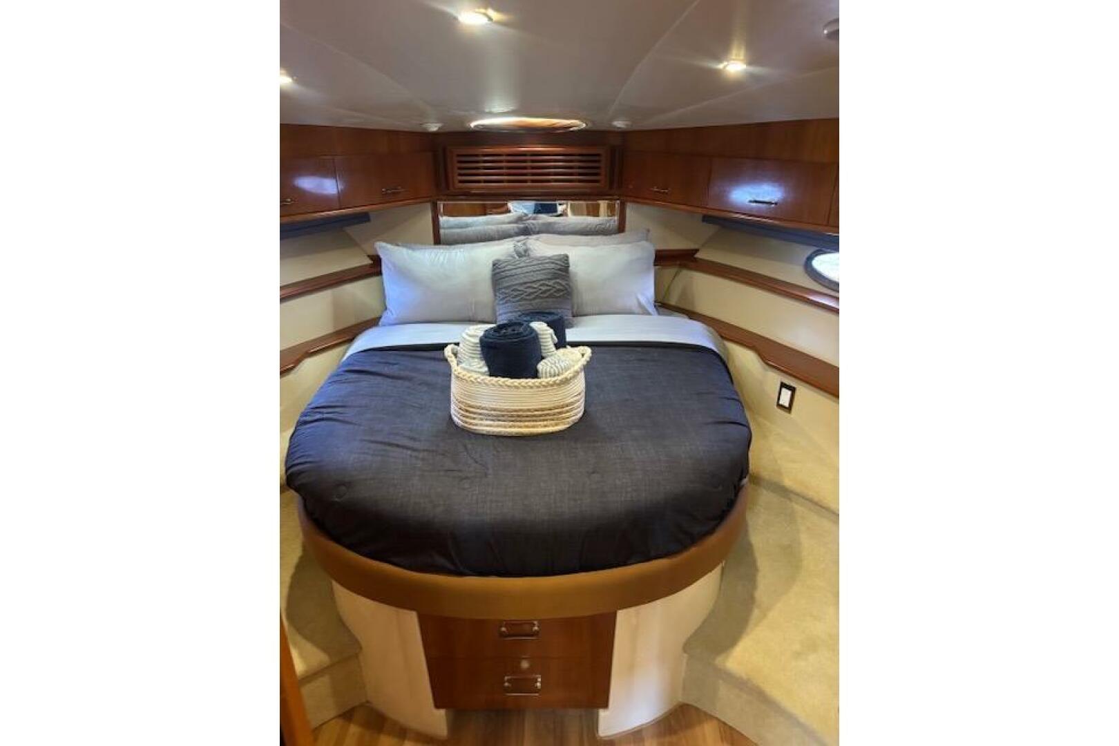 Luxurious bedroom interior of 2004 Carver 466 Motor Yacht wi