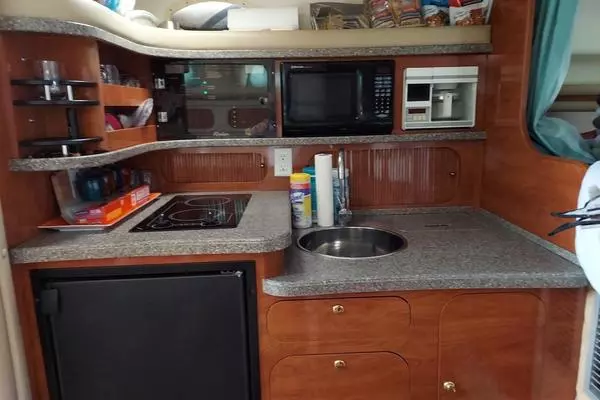 Photo of the 2004 Rinker 342 Fiesta Vee "WHY NOT"