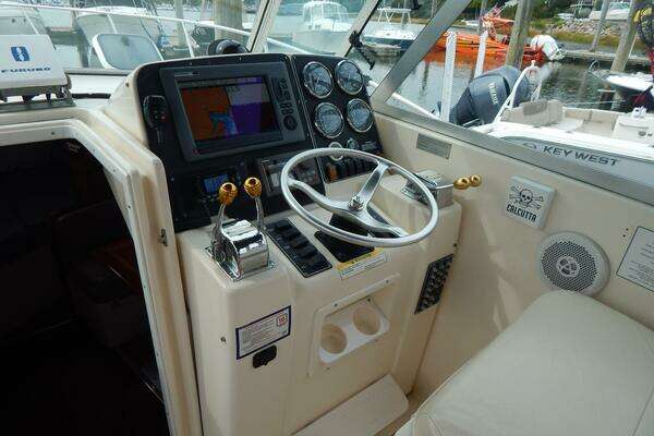 Photo of the 1998 Pursuit 3000 Express "Fish'n Fools"