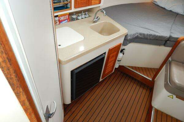 Photo of the 1998 Pursuit 3000 Express "Fish'n Fools"