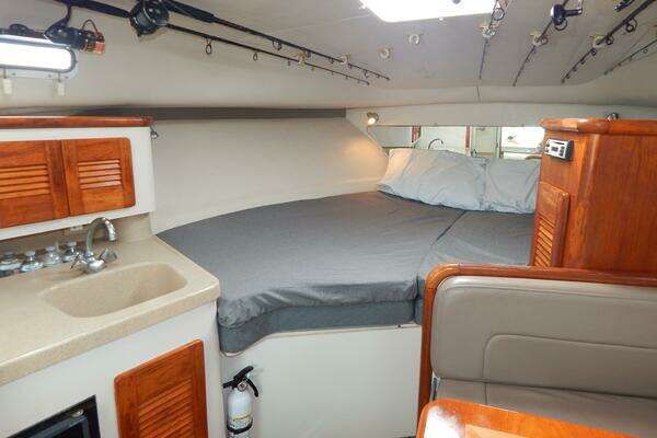 Photo of the 1998 Pursuit 3000 Express "Fish'n Fools"