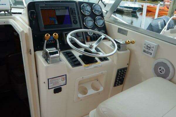 Photo of the 1998 Pursuit 3000 Express "Fish'n Fools"