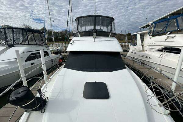 Photo of the 1999 Carver 40 Cockpit "Nauti Savages II"