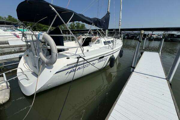 Photo of the 1994 Catalina 320 "HAUNTED by WATER"
