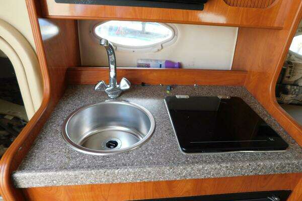 Photo of the 2004 Rinker Fiesta Vee 270 "War Trophy"