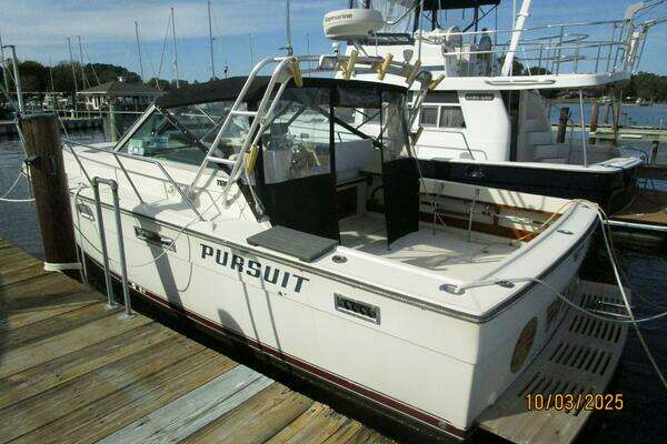 Photo of the 1985 Pursuit 3100 Open "Penny Wise"
