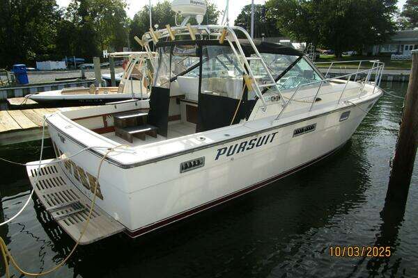 Photo of the 1985 Pursuit 3100 Open "Penny Wise"