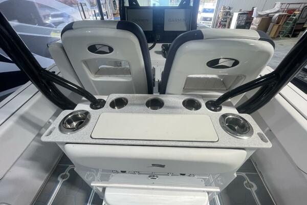 Leaning Post with Cup Holders and Rod Storage on Center Console