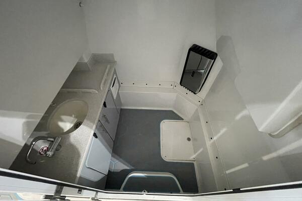 Center Console Boat Head Compartment with Sink and Storage