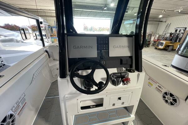 Dual Garmin Helm Electronics and Steering Console Setup