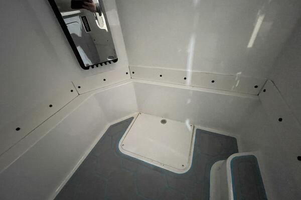 Shower Pan and Fiberglass Interior in Boat Head Compartment