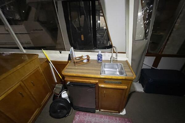 Wet Bar with Sink and Mini Fridge – Egg Harbor 40 Motor Yacht
