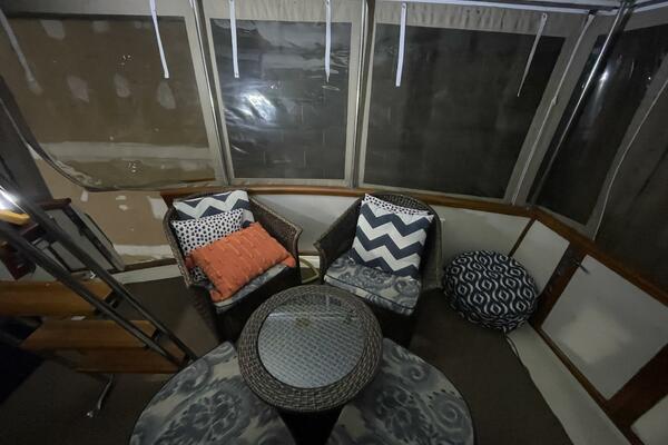 Aft Deck Seating Area with Wicker Chairs – Egg Harbor 40 Motor Yacht