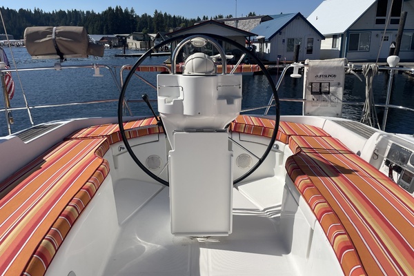 Cockpit of 2007 Beneteau 393 sailboat with striped seating