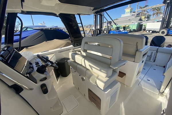 2023 Boston Whaler 350 Realm interior with helm and seating area.