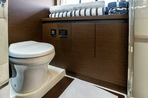 2019 63 Prestige Flybridge - RT Time - VIP Stateroom Head