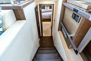 2019 63 Prestige Flybridge - RT Time - Companionway to Staterooms