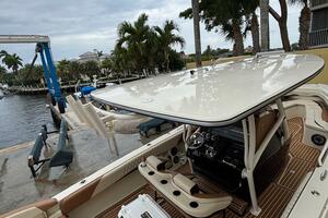 2013 Statement 35 Center Console boat docked, featuring slee
