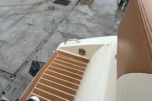 2013 Statement 35 Center Console boat at dock with forklifts