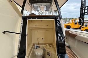 2013 Statement 35 Center Console boat interior with toilet a