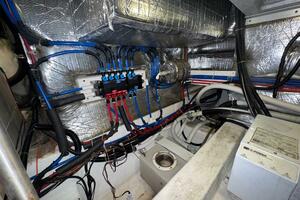 Engine room of a 2000 Carver 506 Motor Yacht with wiring and